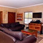 The lounge with DSTV Premium and DVD player.
