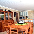 Open plan dining room and kitchen.