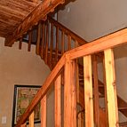 Staircase to the two upstairs bedrooms.