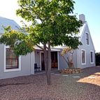 View from the street with the entrance to the separate adjoining cottage on the right hand side.
